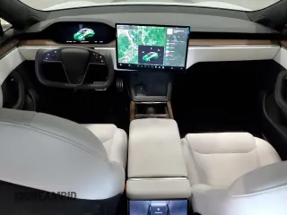 2024 Tesla Model S with VIN 5YJSA1E56RF538488, listed as a Copart auction lot 54702885 with 9,470 mi miles and Salvage title. Bid and sale history available at DreamBid. Image 8.