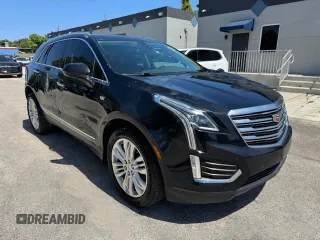 2018 Cadillac XT5 Premium Luxury FWD z VIN 1GYKNERS6JZ139813, wystawiony jako Copart lot #57681285 z przebiegiem 96 567 mil mil oraz Nie do naprawy. Historia ofert i sprzedaży dostępna na DreamBid. Obrazek 4.