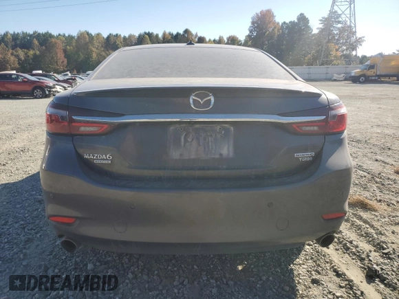 2021 Mazda 6 Signature with VIN JM1GL1XY0M1617051, listed as a Copart auction lot 76715774 with 43,925 mi miles and Salvage Title. Bid and sale history available at DreamBid. Image 6.
