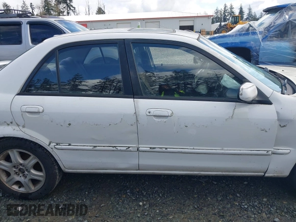 2002 Mazda Protege DX with VIN JM1BJ225520542854, listed as a IAAI auction lot 41955679 with 161,338 mi miles and . Bid and sale history available at DreamBid. Image 13.