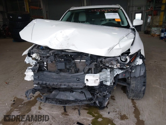2020 Mazda CX-5 Grand Touring with VIN JM3KFADMXL0742038, listed as a IAAI auction lot 42292400 with 68,339 mi miles and . Bid and sale history available at DreamBid. Image 6.