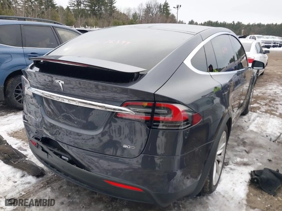 2016 Tesla Model X 70D with VIN 5YJXCAE2XGF014165, listed as a IAAI auction lot 41474490 with 112,967 mi miles. Bid and sale history available at carsss.com. Image 4.