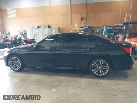 2019 BMW 7 Series 750i xDrive with VIN WBA7F2C51KB239044, listed as a IAAI auction lot 42756026 with 65,028 mi miles and . Bid and sale history available at DreamBid. Image 14.