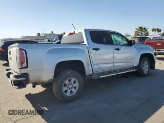 2019 GMC Canyon 2WD with VIN 1GTG5BEA1K1187730, listed as a Copart auction lot 77420574 with 103,127 mi miles and Salvage Title. Bid and sale history available at carsss.com. Image 3.