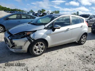 2015 Ford Fiesta SE z VIN 3FADP4EJ3FM115449, wystawiony jako Copart lot #57408015 z przebiegiem 175 083 mil mil oraz Czysty tytuł • Clean title. Historia ofert i sprzedaży dostępna na DreamBid. Obrazek 1.