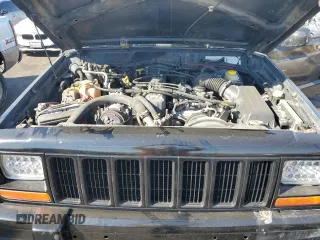 1998 Jeep Cherokee Sport with VIN 1J4FT68S8WL134461, listed as a Copart auction lot 74005704 with 0 mi miles and Salvage Title. Bid and sale history available at carsss.com. Image 11.