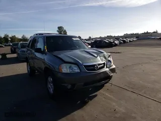 2004 Mazda Tribute LX with VIN 4F2YZ94134KM33788, listed as a Copart auction lot 72655784 with 259,397 mi miles and Salvage Title. Bid and sale history available at carsss.com. Image 11.