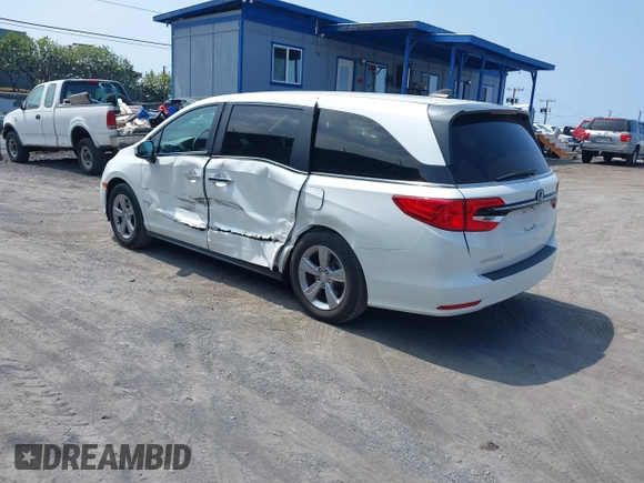 2022 Honda Odyssey EX-L with VIN 5FNRL6H79NB054120, listed as a IAAI auction lot 41694040 with 55,036 mi miles and . Bid and sale history available at DreamBid. Image 3.