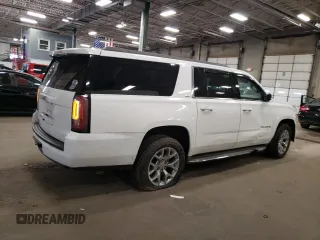 2015 GMC Yukon XL SLT z VIN 1GKS2HKC4FR545409, wystawiony jako Copart lot #55401425 z przebiegiem 214 848 mil mil oraz Czysty tytuł • Clean title. Historia ofert i sprzedaży dostępna na DreamBid. Obrazek 3.