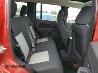 2009 Jeep Liberty Sport with VIN 1J8GN28K89W551684, listed as a Copart auction lot 76122674 with 14,631 mi miles and Salvage Title. Bid and sale history available at DreamBid. Image 11.