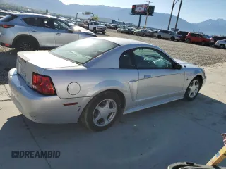 2003 Ford Mustang Standard z VIN 1FAFP40463F327722, wystawiony jako Copart lot #55042765 z przebiegiem 117 010 mil mil oraz Szkoda całkowita • Salvage title. Historia ofert i sprzedaży dostępna na DreamBid. Obrazek 3.