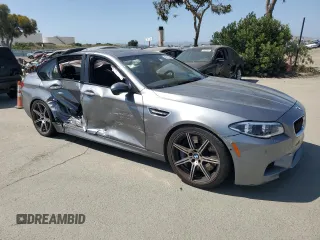 2014 BMW M5 z VIN WBSFV9C58ED593431, wystawiony jako Copart lot #54870555 z przebiegiem 172 191 mil mil oraz Szkoda całkowita • Salvage title. Historia ofert i sprzedaży dostępna na DreamBid. Obrazek 4.