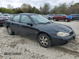 1998 Mercury Mystique z VIN 1MEFM66L7WK639796, wystawiony jako Copart lot #52880105 z przebiegiem 254 649 mil mil oraz Nie do naprawy. Historia ofert i sprzedaży dostępna na DreamBid. Obrazek 4.