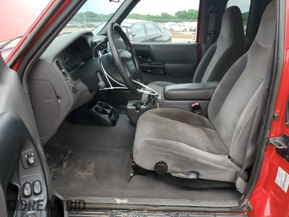 1999 Ford Ranger XLT z VIN 1FTZR15X5XTA88531, wystawiony jako Copart lot #54200215 z przebiegiem 194 139 mil mil oraz Szkoda całkowita • Salvage title. Historia ofert i sprzedaży dostępna na DreamBid. Obrazek 7.