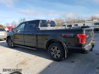 2015 Ford F-150 XLT w/HD Payload Pkg with VIN 1FTFW1EF8FKD63767, listed as a Copart auction lot 87078584 with 136,306 mi miles and Salvage Title. Bid and sale history available at carsss.com. Image 2.