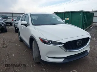2020 Mazda CX-5 Touring with VIN JM3KFBCM6L0764982, listed as a IAAI auction lot 41632293 with 96,042 mi miles. Bid and sale history available at carsss.com. Image 1.