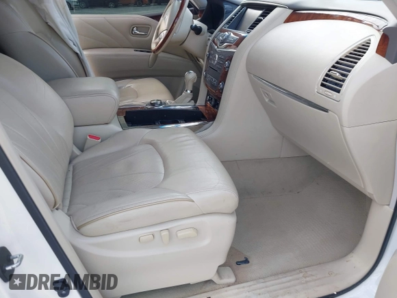 2016 Infiniti QX80 with VIN JN8AZ2NE7G9125016, listed as a IAAI auction lot 42080053 with 114,655 mi miles. Bid and sale history available at carsss.com. Image 5.