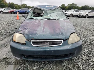 1997 Honda Civic DX with VIN JHMEJ6624VS038386, listed as a Copart auction lot 71541574 with 385,295 mi miles and Salvage Title. Bid and sale history available at carsss.com. Image 5.