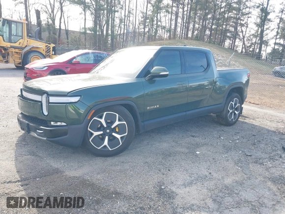2022 Rivian R1T Adventure z VIN 7FCTGAAA8NN015369, wystawiony jako IAAI lot #41407842 z przebiegiem 22 507 mil mil oraz . Historia ofert i sprzedaży dostępna na DreamBid. Obrazek 20.