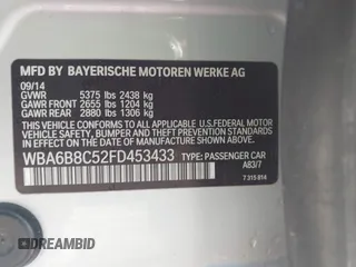 2015 BMW 6 Series 640i xDrive with VIN WBA6B8C52FD453433, listed as a IAAI auction lot 41805317 with 138,685 mi miles and . Bid and sale history available at carsss.com. Image 9.