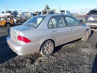 2003 Mitsubishi Lancer ES with VIN JA3AJ26E63U092730, listed as a IAAI auction lot 41506294 with 188,007 mi miles. Bid and sale history available at carsss.com. Image 4.