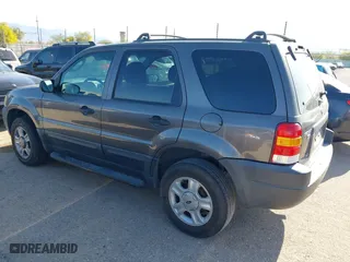 2004 Ford Escape XLT with VIN 1FMCU03134KA96184, listed as a IAAI auction lot 41917091 with 246,067 mi miles. Bid and sale history available at carsss.com. Image 3.