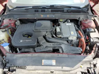 2013 Ford Fusion SE Hybrid z VIN 3FA6P0LUXDR335590, wystawiony jako Copart lot #60541395 z przebiegiem 121 975 mil mil oraz Szkoda całkowita • Salvage title. Historia ofert i sprzedaży dostępna na DreamBid. Obrazek 11.