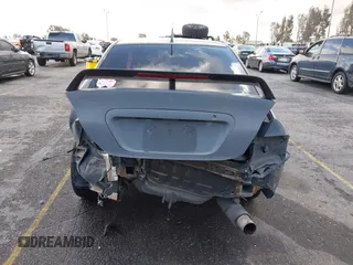 2004 Mitsubishi Lancer ES with VIN JA3AJ26E54U054570, listed as a IAAI auction lot 41592397 with 220,140 mi miles. Bid and sale history available at carsss.com. Image 16.