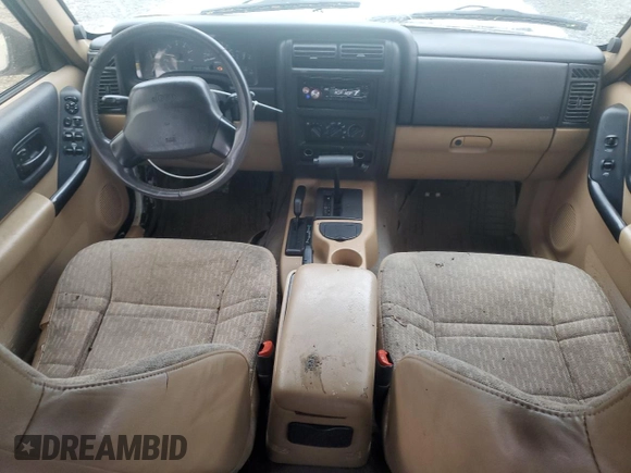 2000 Jeep Cherokee with VIN 1J4FF48S1YL174377, listed as a Copart auction lot 50032345 with 204,234 mi miles and Salvage title. Bid and sale history available at DreamBid. Image 8.
