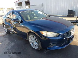 2016 Mazda Mazda6 i Touring with VIN JM1GJ1V52G1484313, listed as a IAAI auction lot 41320627 with 132,335 mi miles. Bid and sale history available at carsss.com. Image 1.