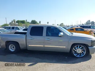 2007 Chevrolet Silverado 1500 LS with VIN 3GCEC13C87G516170, listed as a IAAI auction lot 42163134 with 185,591 mi miles and . Bid and sale history available at DreamBid. Image 14.