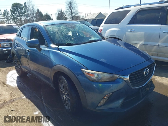 2018 Mazda CX-3 Touring z VIN JM1DKFC73J0301449, wystawiony jako IAAI lot #41678604 z przebiegiem 105 249 mil mil oraz . Historia ofert i sprzedaży dostępna na DreamBid. Obrazek 13.