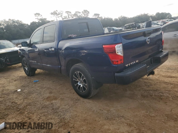 2020 Nissan Titan Platinum Reserve with VIN 1N6AA1EFXLN505021, listed as a Copart auction lot 41728575 with 64,623 mi miles and Salvage title. Bid and sale history available at DreamBid. Image 2.