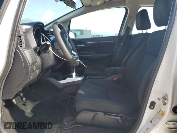 2019 Honda Fit LX with VIN 3HGGK5H48KM737557, listed as a Copart auction lot 55716935 with 123,210 mi miles and Salvage title. Bid and sale history available at DreamBid. Image 7.