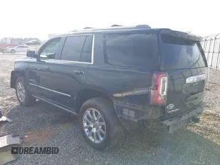 2015 GMC Yukon Denali with VIN 1GKS1CKJ8FR612971, listed as a IAAI auction lot 41519689 with 197,003 mi miles. Bid and sale history available at carsss.com. Image 3.