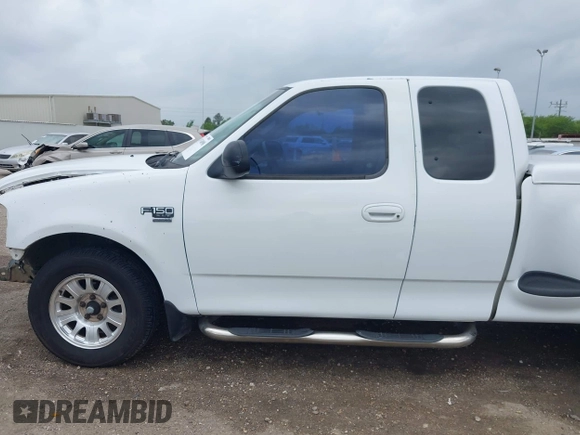 2001 Ford F-150 XL with VIN 2FTRX07L21CA73710, listed as a IAAI auction lot 41934098 with 1 mi miles. Bid and sale history available at carsss.com. Image 15.