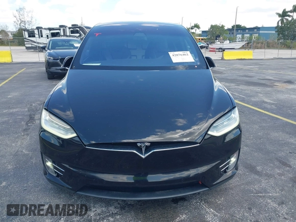 2017 Tesla Model X 90D with VIN 5YJXCBE21HF054898, listed as a IAAI auction lot 42076462 with 89,996 mi miles and . Bid and sale history available at DreamBid. Image 11.