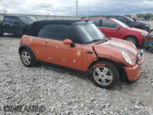 2006 MINI Convertible with VIN WMWRF335X6TG15824, listed as a Copart auction lot 56163205 with 113,109 mi miles and Salvage title. Bid and sale history available at DreamBid. Image 4.