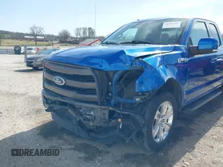 2015 Ford F-150 XLT with VIN 1FTFX1EG8FFA71891, listed as a IAAI auction lot 41818462 with 97,757 mi miles. Bid and sale history available at carsss.com. Image 6.