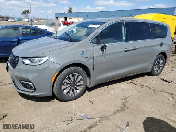 2023 Chrysler Pacifica Hybrid Touring L with VIN 2C4RC1L7XPR572495, listed as a Copart auction lot 51464745 with 33,397 mi miles and Clean Title. Bid and sale history available at carsss.com. Image 1.