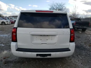 2020 Chevrolet Tahoe Commercial z VIN 1GNSKDEC8LR240143, wystawiony jako Copart lot #79911654 z przebiegiem 99 084 mil mil oraz Szkoda całkowita • Salvage title. Historia ofert i sprzedaży dostępna na DreamBid. Obrazek 6.