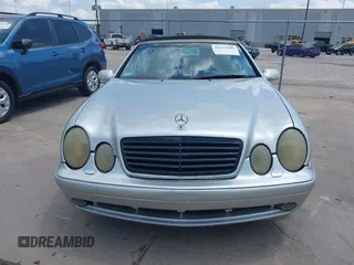 2001 Mercedes-Benz CLK 320/430 z VIN WDBLK70G71T074205, wystawiony jako IAAI lot #42319109 z przebiegiem 214 707 mil mil oraz . Historia ofert i sprzedaży dostępna na DreamBid. Obrazek 13.