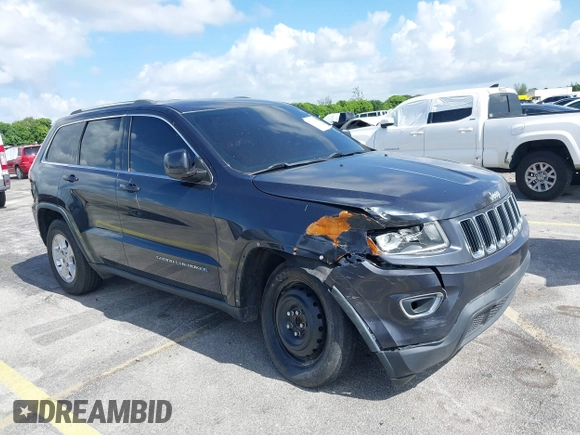 2014 Jeep Grand Cherokee Laredo with VIN 1C4RJEAG0EC179563, listed as a IAAI auction lot 39799427 with 209,169 mi miles and . Bid and sale history available at DreamBid. Image 1.