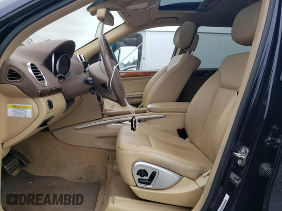 2007 Mercedes-Benz GL-Class with VIN 4JGBF71E97A212423, listed as a Copart auction lot 74560094 with 129,793 mi miles and Salvage Title. Bid and sale history available at carsss.com. Image 7.