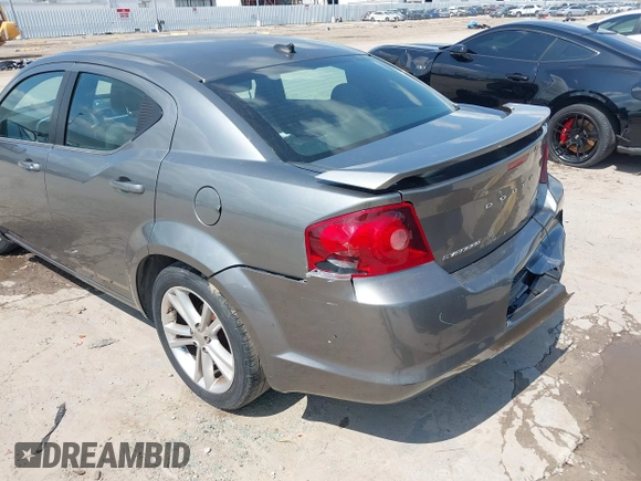 2012 Dodge Avenger SXT with VIN 1C3CDZCB9CN212328, listed as a IAAI auction lot 42360745 with 189,311 mi miles and . Bid and sale history available at DreamBid. Image 19.