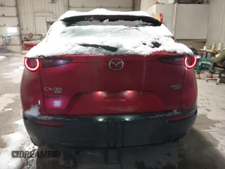 2022 Mazda CX-30 2.5 Turbo with VIN 3MVDMBAY5NM427943, listed as a IAAI auction lot 41585519 with 32,807 mi miles and . Bid and sale history available at DreamBid. Image 16.