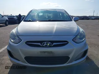 2013 Hyundai Accent GLS with VIN KMHCT4AE4DU477465, listed as a IAAI auction lot 41930256 with 48,877 mi miles and . Bid and sale history available at carsss.com. Image 12.