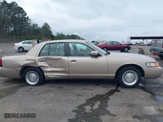 1998 Mercury Grand Marquis LS with VIN 2MEFM75W2WX695255, listed as a IAAI auction lot 41481865 with 177,365 mi miles. Bid and sale history available at carsss.com. Image 13.