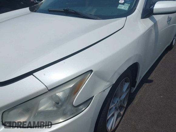 2014 Nissan Maxima S with VIN 1N4AA5AP9EC499211, listed as a IAAI auction lot 42377529 with 163,977 mi miles and . Bid and sale history available at DreamBid. Image 6.