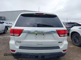 2012 Jeep Grand Cherokee Laredo with VIN 1C4RJFAG5CC224032, listed as a IAAI auction lot 42069334 with 106,614 mi miles. Bid and sale history available at carsss.com. Image 17.